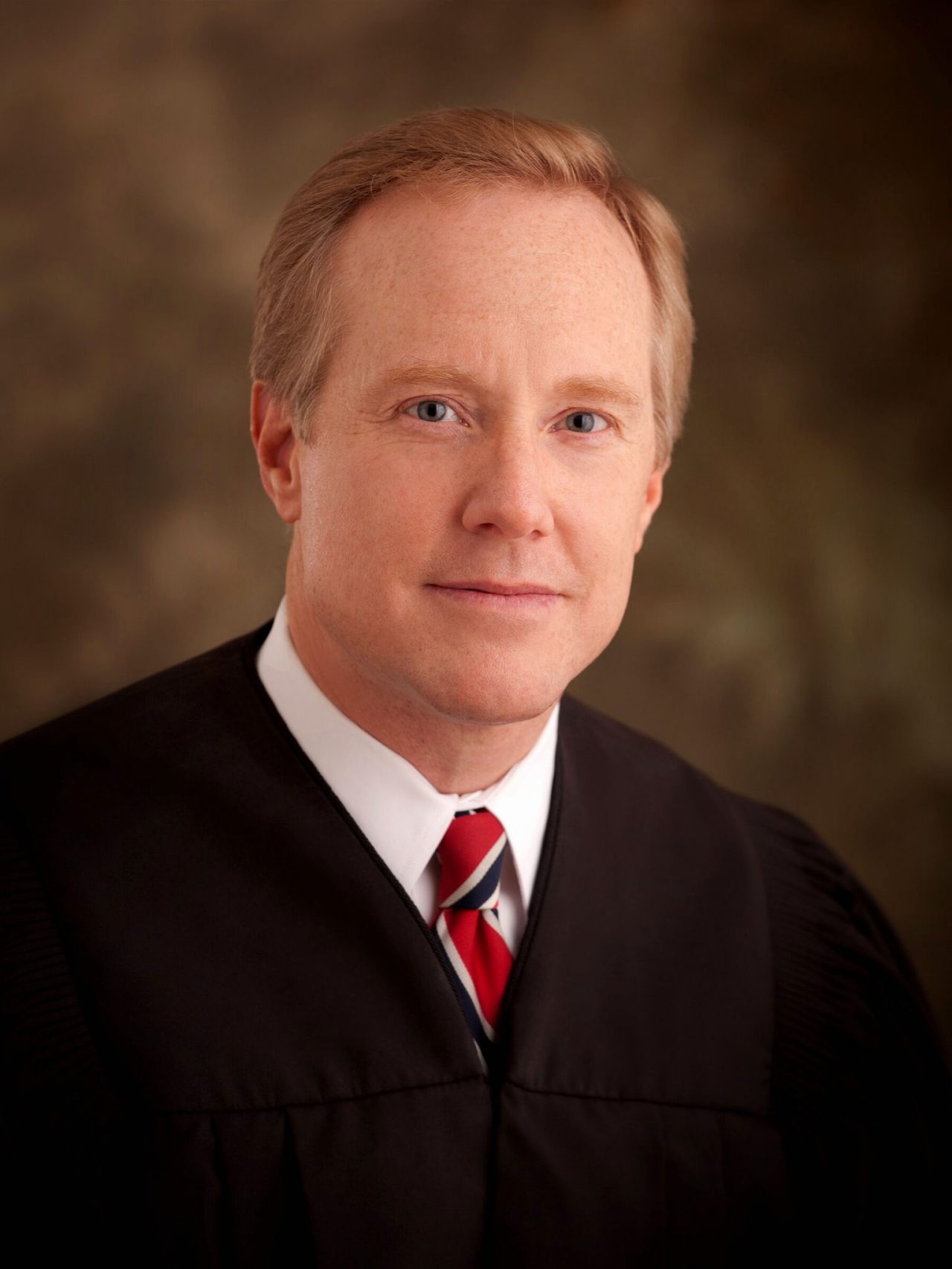 JUDGE THOMAS LOW