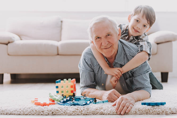 Portrait Grandpa and Grandson Playing with Toys. Family Relationship Between Grandfather and Grandson. Grandpa Teaching, Male Grandchild, Learning Concept. Relations and People Concept.
