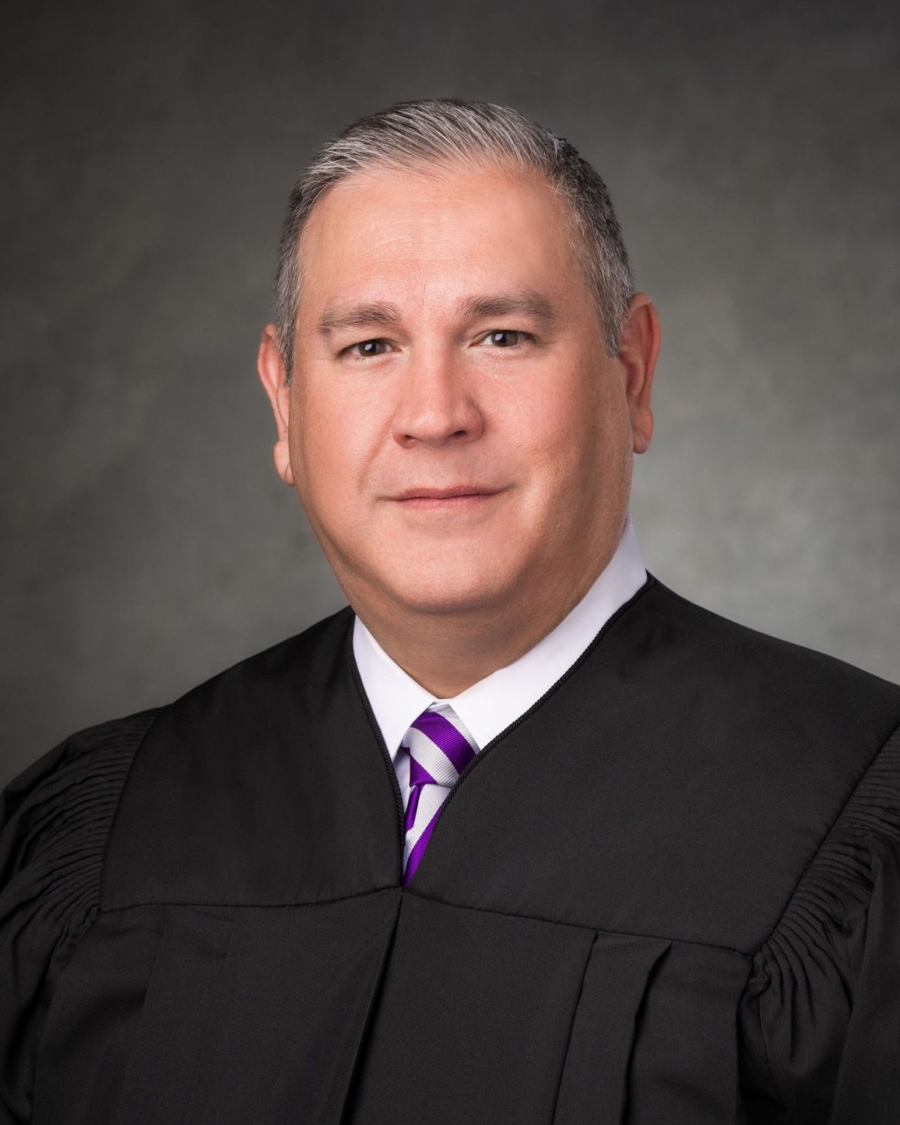 JUDGE RYAN E. CHRISTIANSEN
