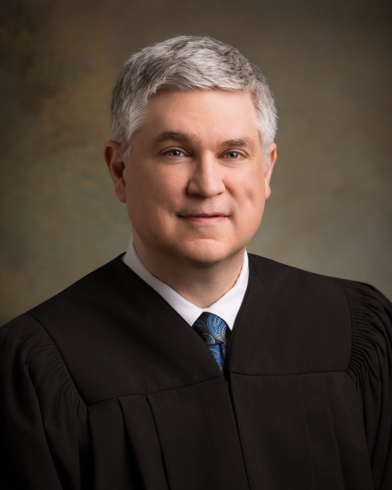 COMMISSIONER DUSTIN A. HARDY