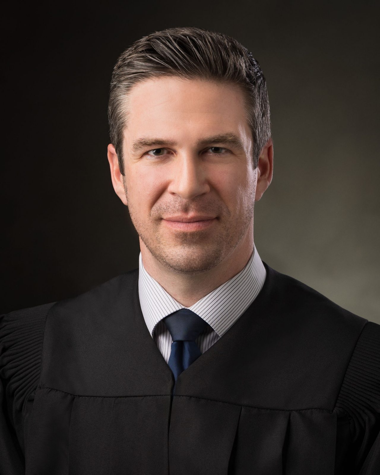 JUDGE RYAN HOLTAN